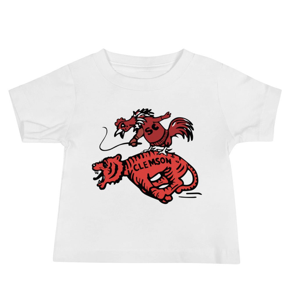 Vintage South Carolina Rivalry Baby T Shirt - 1950s Gamecock riding a Clemson Tiger Art Baby Staple Tee - rivalryweek