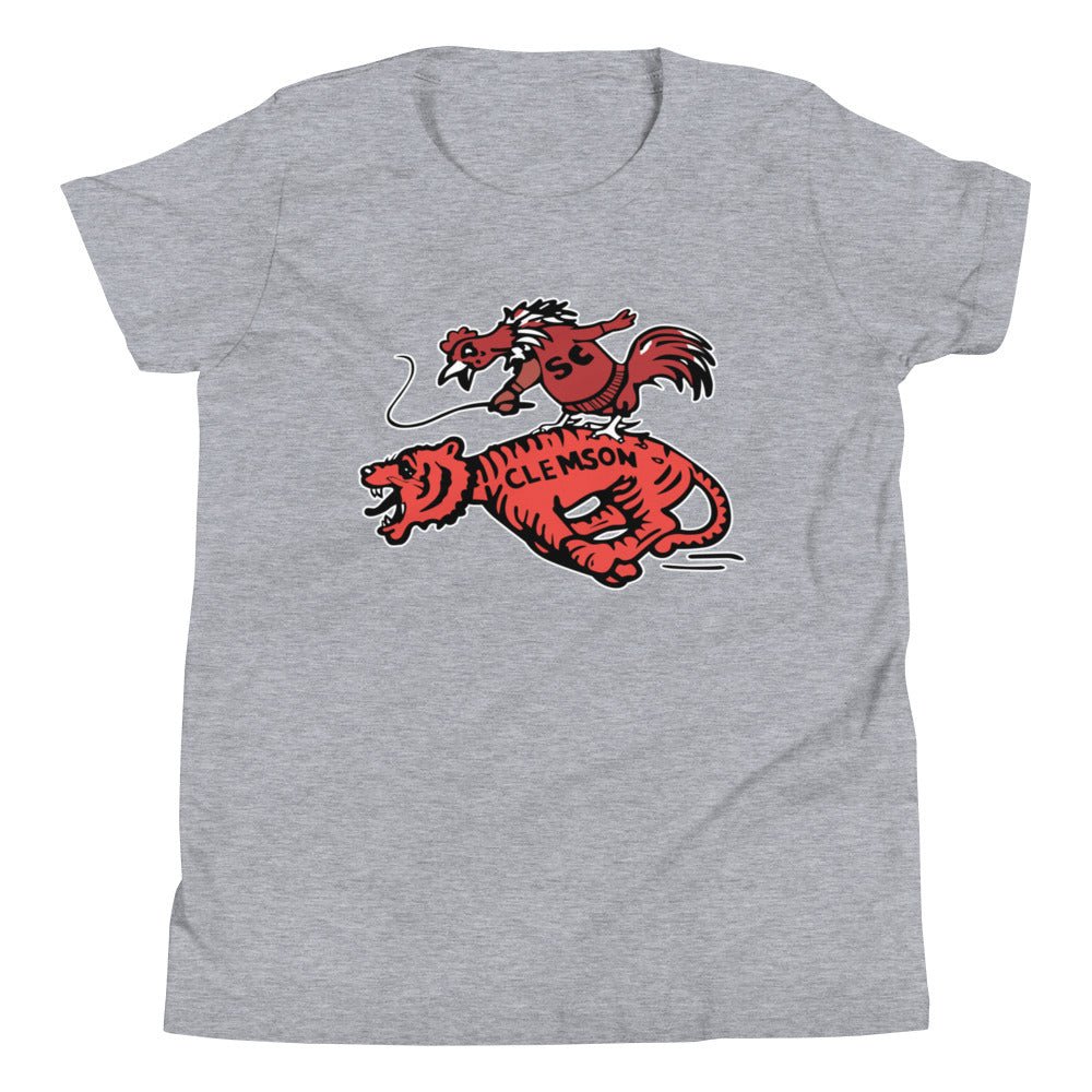 Vintage South Carolina Rivalry Kids Youth Shirt - 1950s Gamecock riding a Clemson Tiger Art Youth Staple Tee - rivalryweek