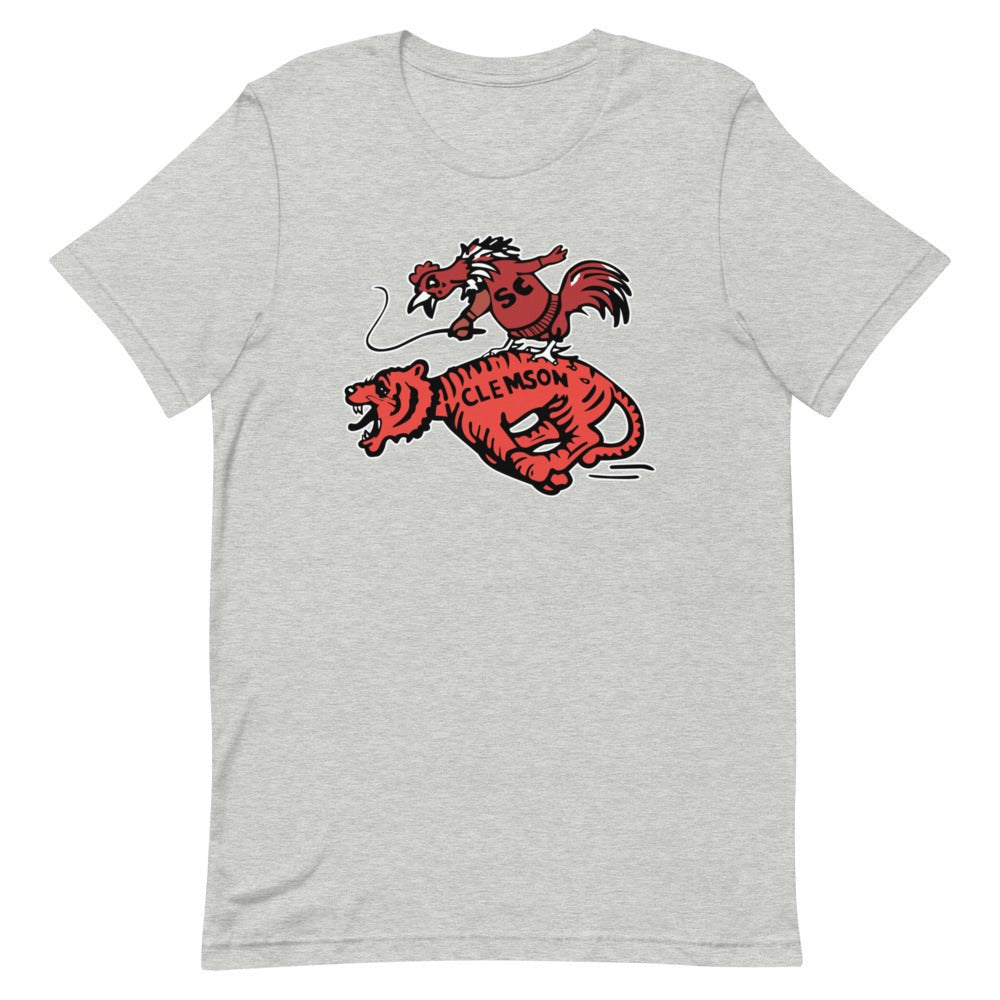 Vintage South Carolina Rivalry Shirt - 1950s Gamecock riding a Clemson Tiger Art Shirt - rivalryweek