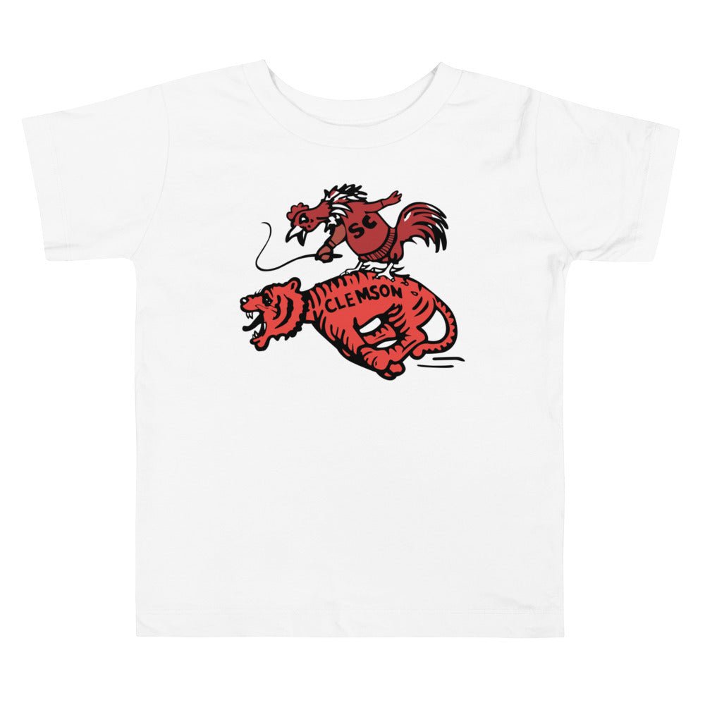 Vintage South Carolina Rivalry Toddler T Shirt - 1950s Gamecock riding a Clemson Tiger Art Toddler Staple Tee - rivalryweek